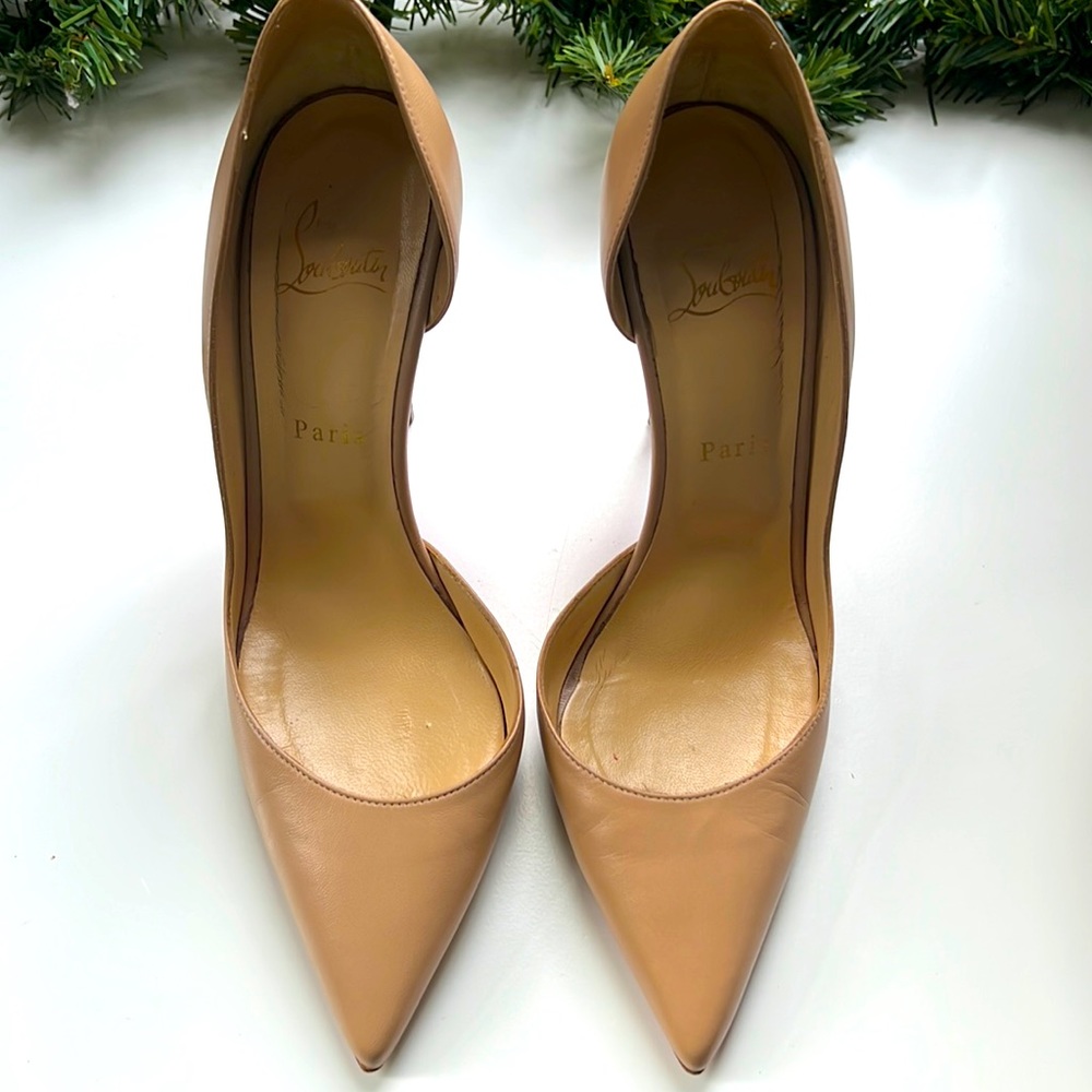 Christian Louboutin nude heel. 100 mm. Size 39. some wear and tear.